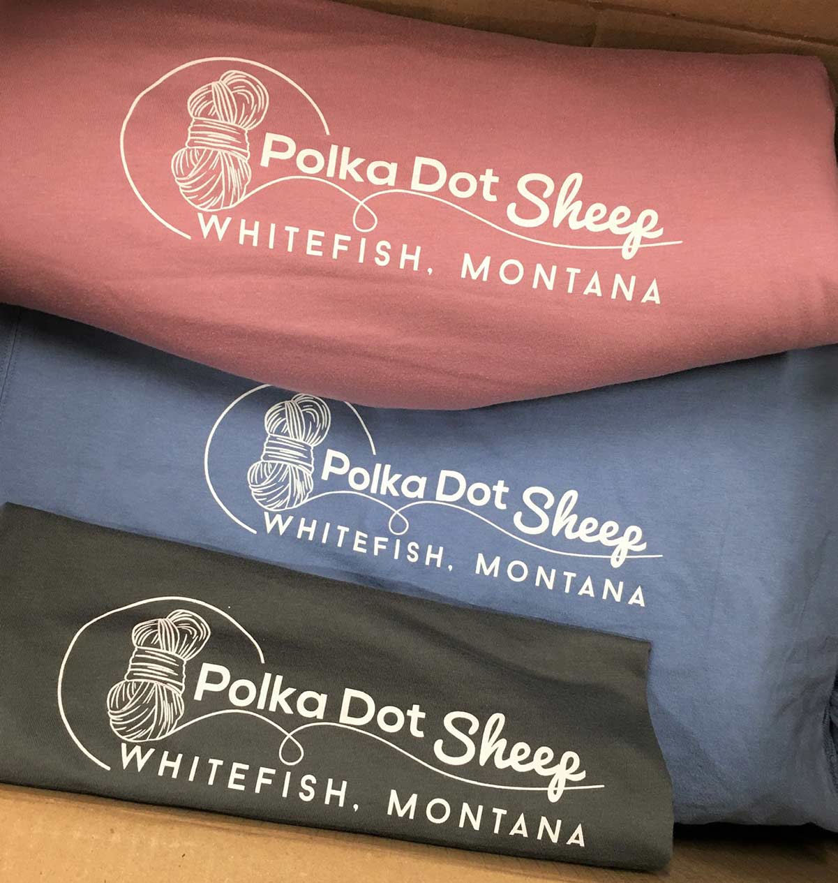 Stack of shirts for Whitefish business